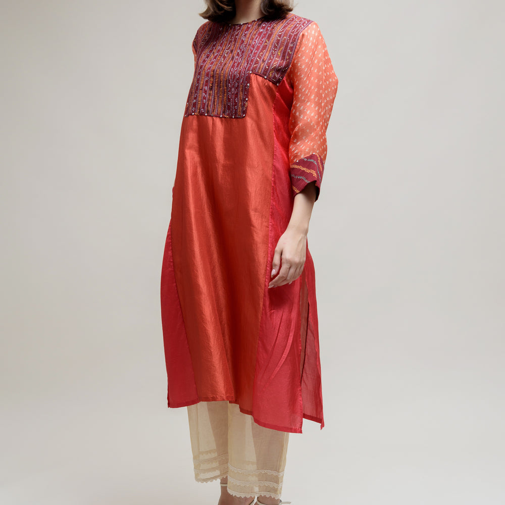 
                      
                        Brick Brown Orange Silk Organza Kurta with a Unique Yoke
                      
                    