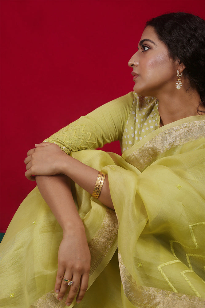 
                      
                        Lime Organza Saree with Bandhej Blouse
                      
                    