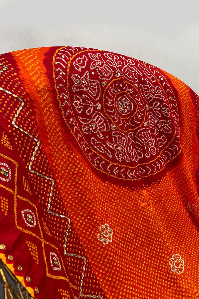 
                      
                        Peela Bandhani on Gaji Silk Dupatta with Gota Patti
                      
                    