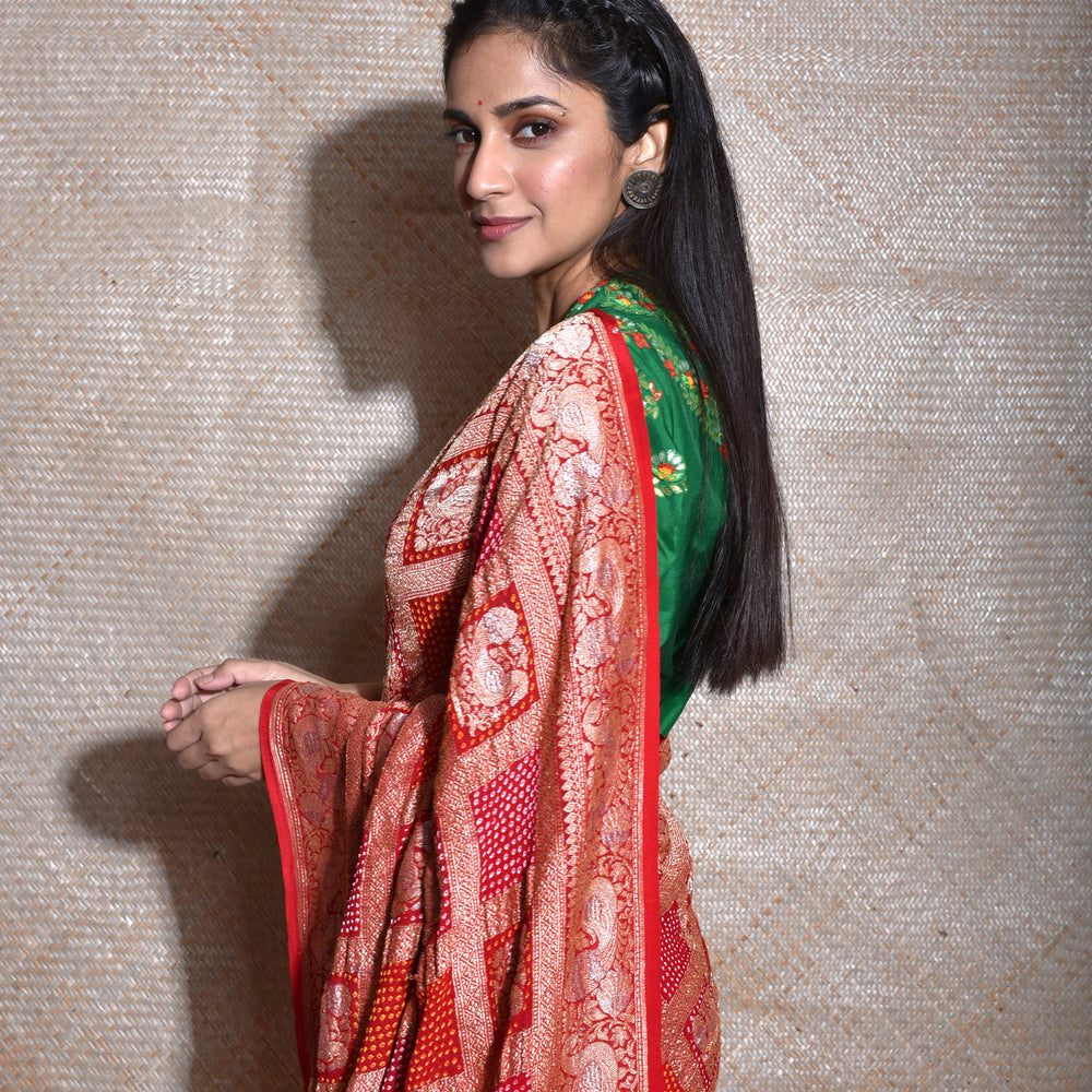 
                      
                        Peacock Border Banarasi Bandhani Gharchola Saree in Red
                      
                    