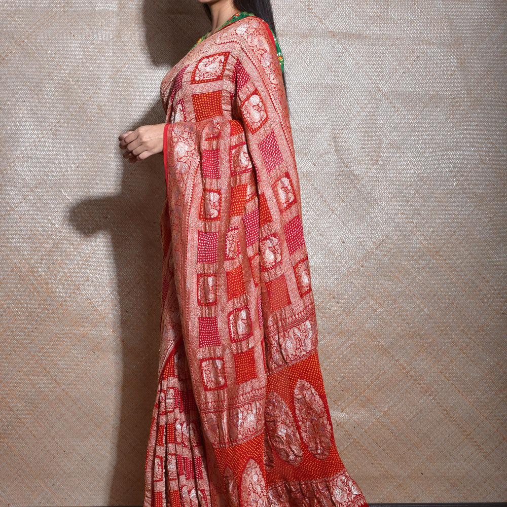 
                      
                        Peacock Border Banarasi Bandhani Gharchola Saree in Red
                      
                    