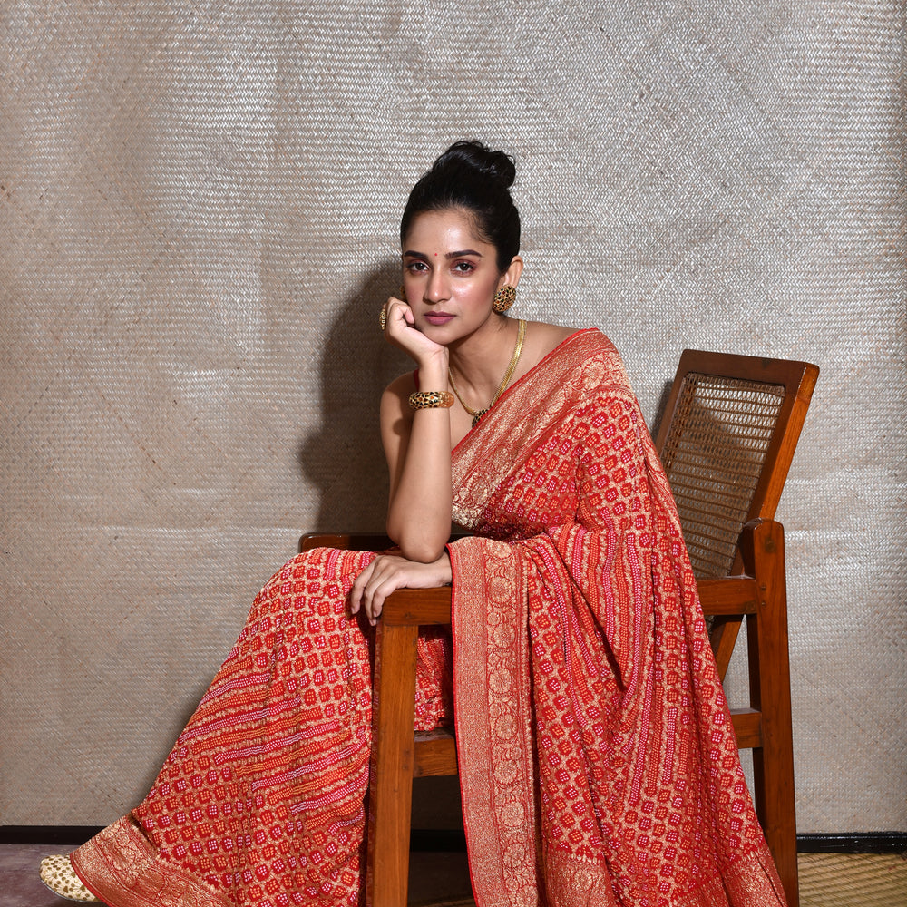 
                      
                        Pure Zari Saree Banarasi Bandhani In Vermilion Red.
                      
                    