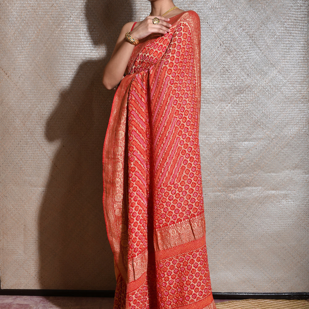 
                      
                        Pure Zari Saree Banarasi Bandhani In Vermilion Red.
                      
                    