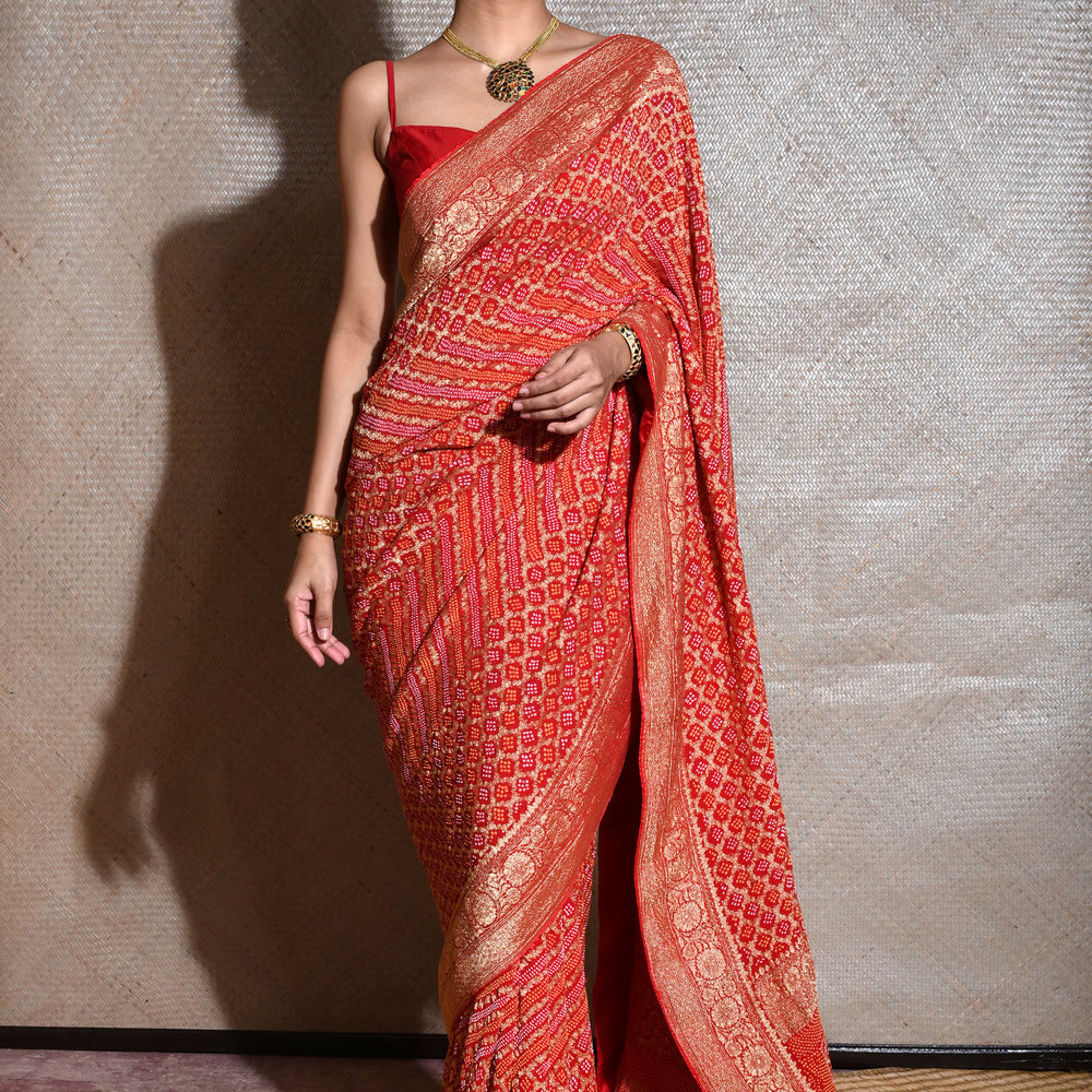 
                      
                        Pure Zari Saree Banarasi Bandhani In Vermilion Red.
                      
                    