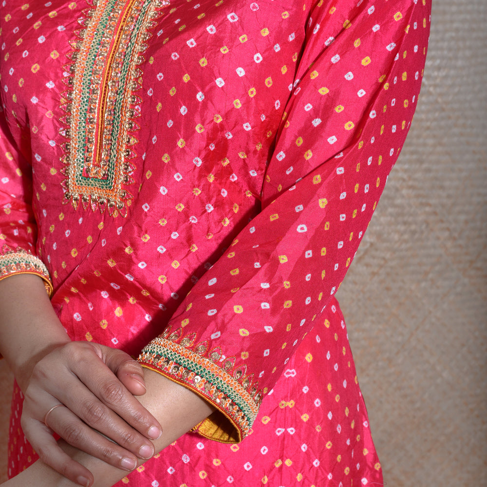 
                      
                        Red Bandhani on Silk Kurta with Thread Work
                      
                    