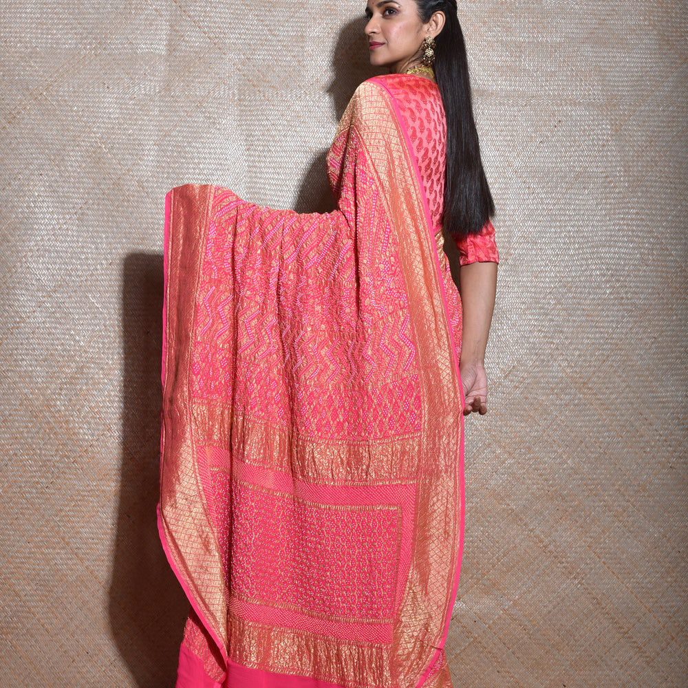 
                      
                        Regal and Evergreen Pure Zari Banarasi Bandhani Saree in Peach
                      
                    