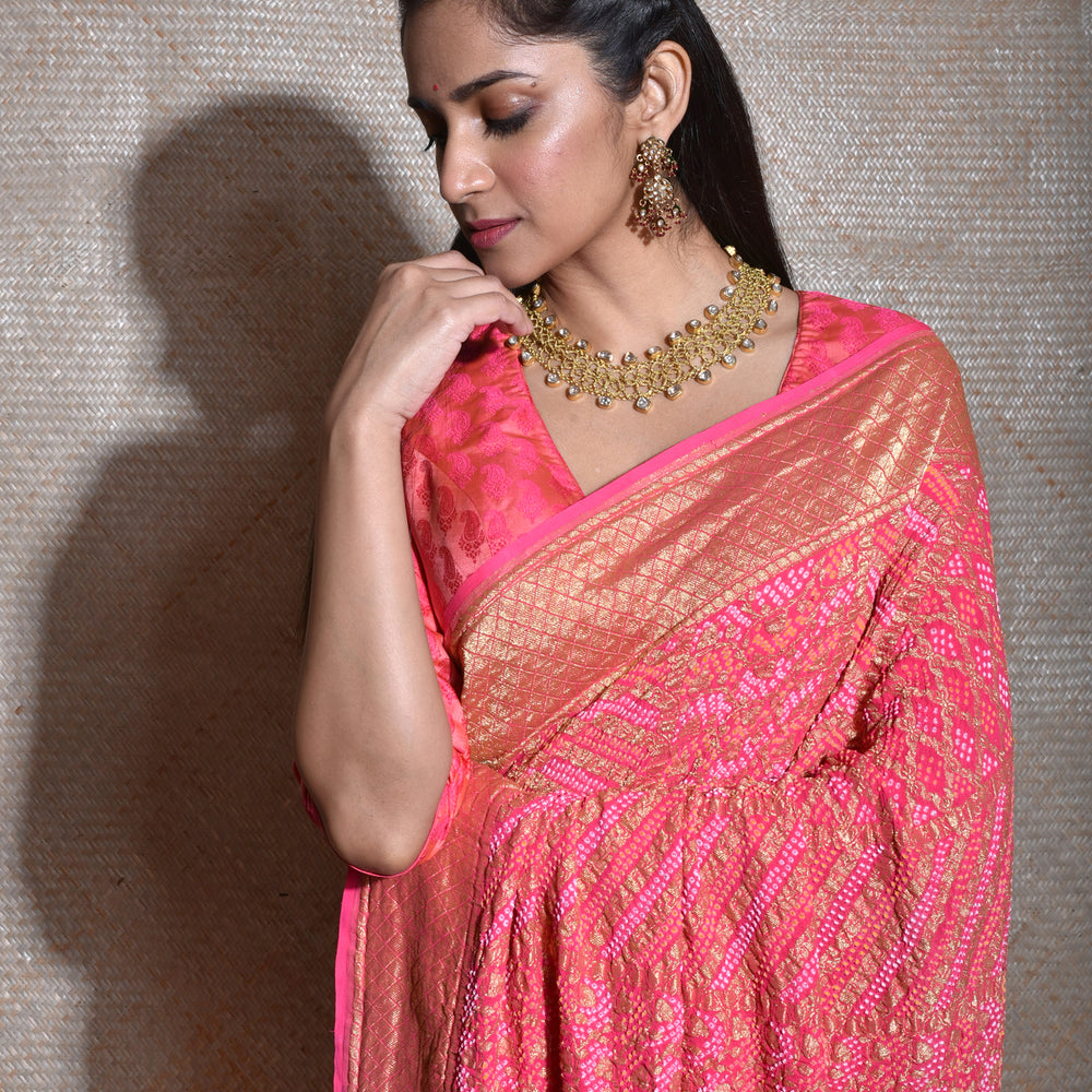 
                      
                        Regal and Evergreen Pure Zari Banarasi Bandhani Saree in Peach
                      
                    