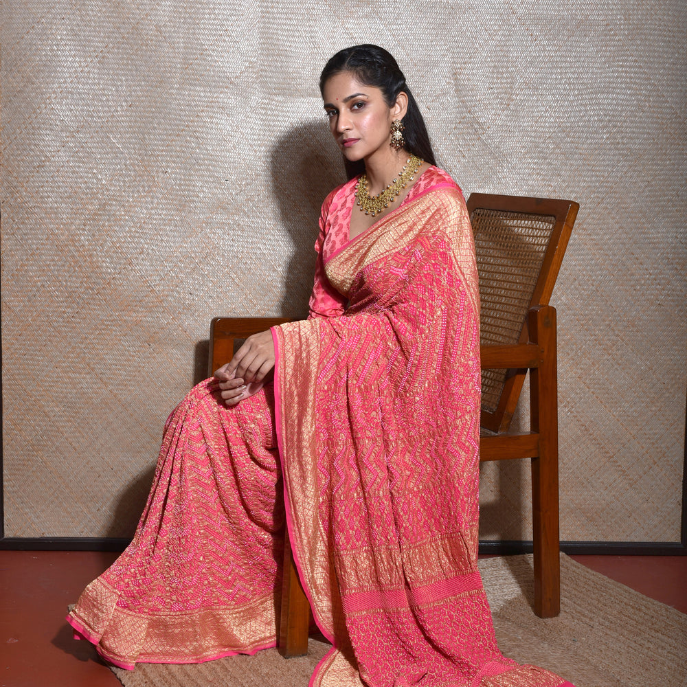 
                      
                        Regal and Evergreen Pure Zari Banarasi Bandhani Saree in Peach
                      
                    