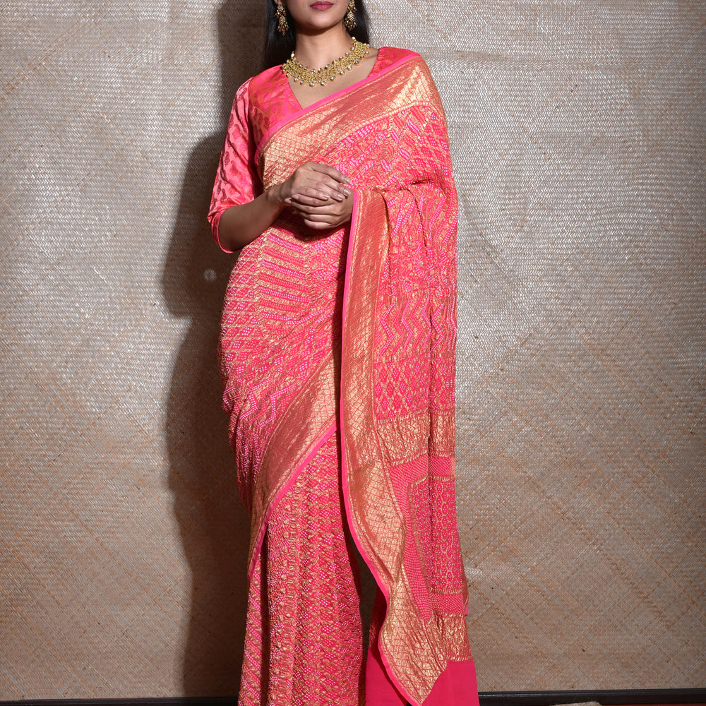 
                      
                        Regal and Evergreen Pure Zari Banarasi Bandhani Saree in Peach
                      
                    