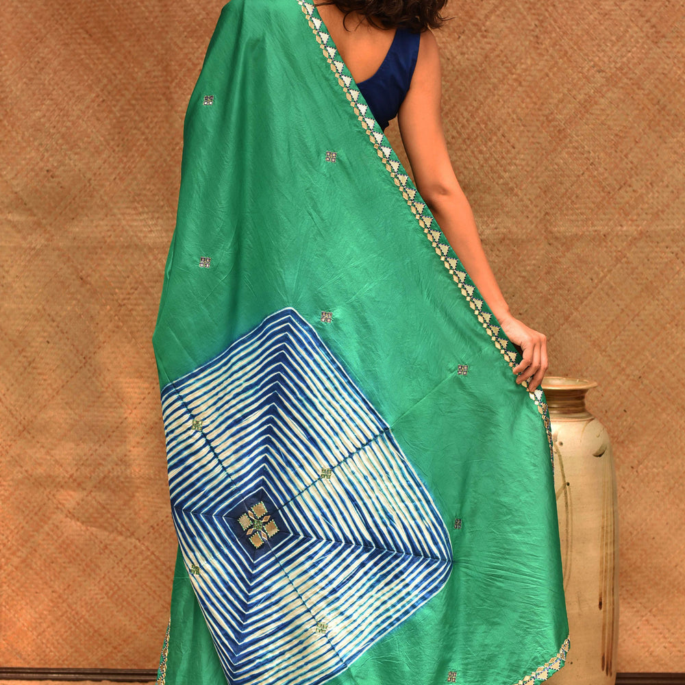 
                      
                        Green Blue Arashi Silk Saree
                      
                    