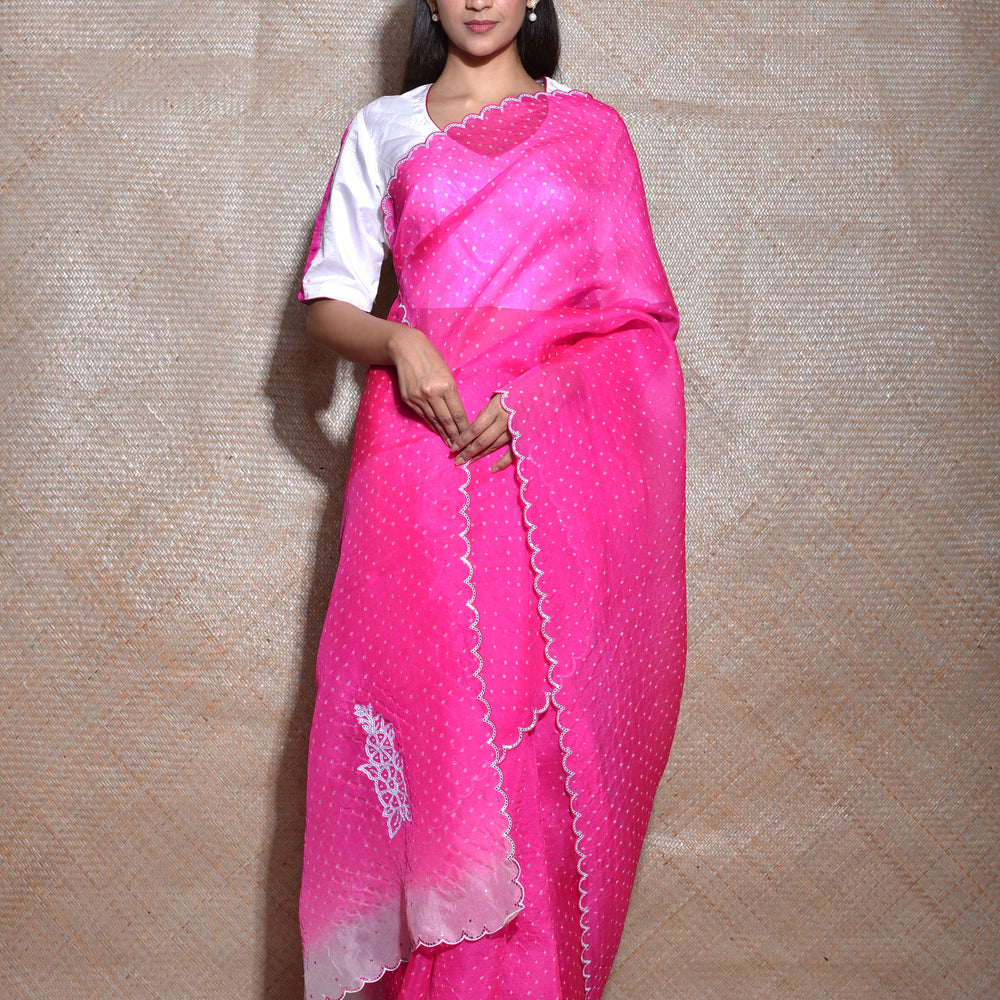 
                      
                        Bandhani on Organza Saree with Mirror Work - Rani White
                      
                    