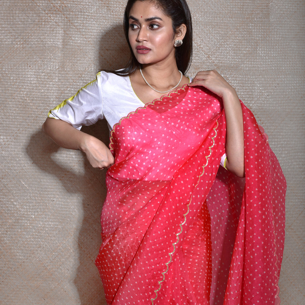 
                      
                        Bandhani on Organza Saree with Mirror Work - Tomato Lime
                      
                    