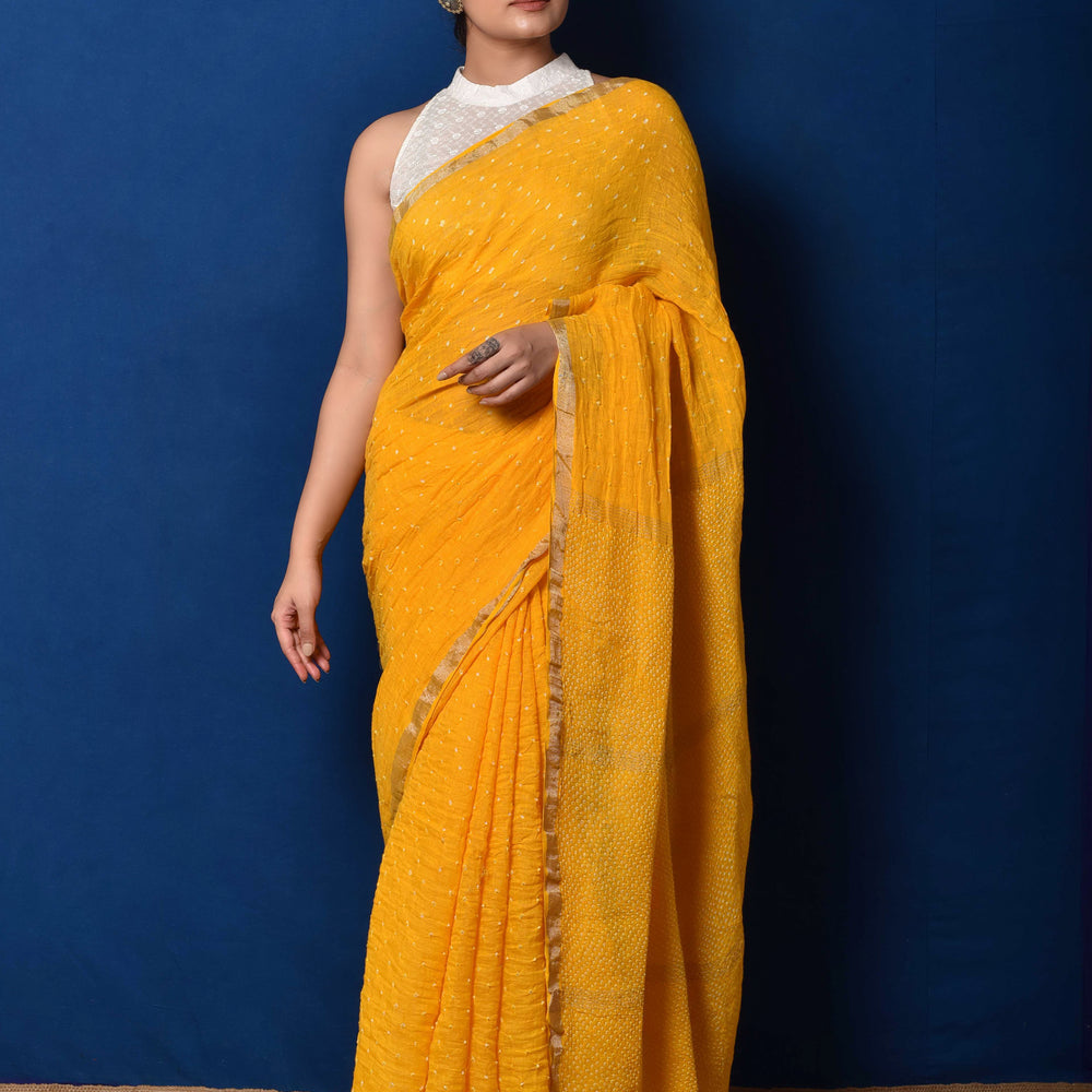 
                      
                        Yellow Bandhani on Linen Saree
                      
                    