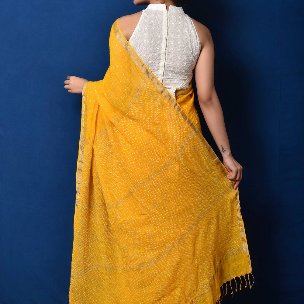 
                      
                        Yellow Bandhani on Linen Saree
                      
                    