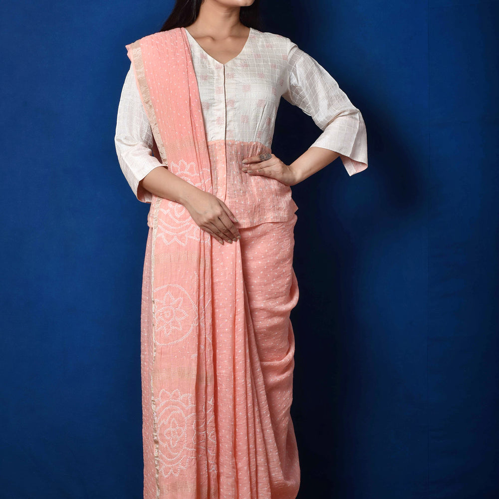 
                      
                        Peach Linen Bandhani Saree
                      
                    