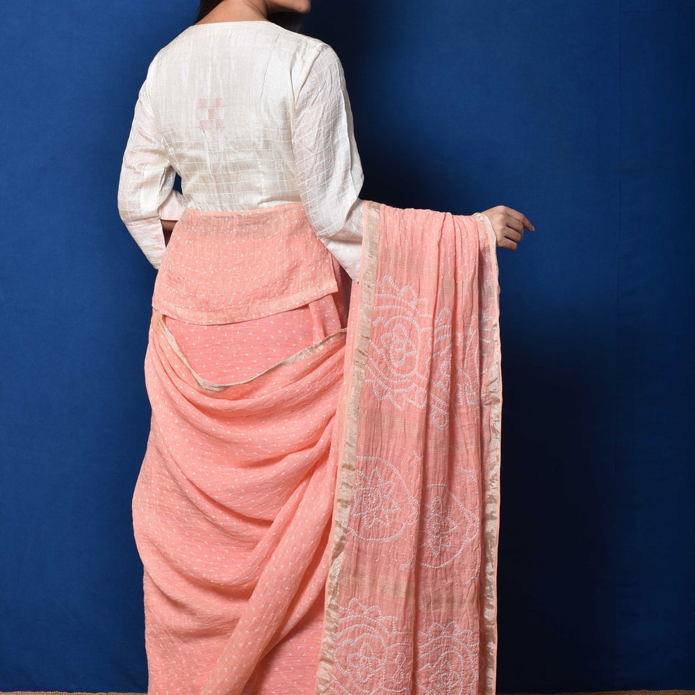 
                      
                        Peach Linen Bandhani Saree
                      
                    