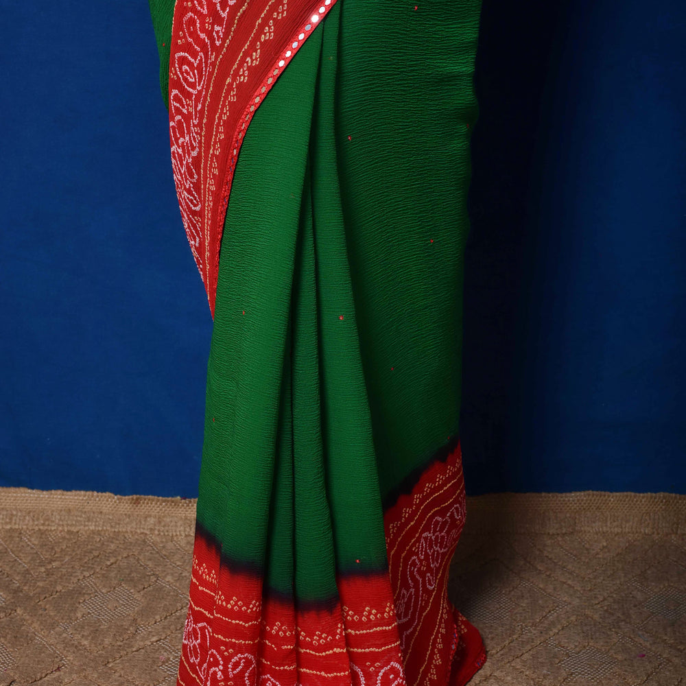 
                      
                        Classic Red and Green Bandhani on Chiffon Saree
                      
                    