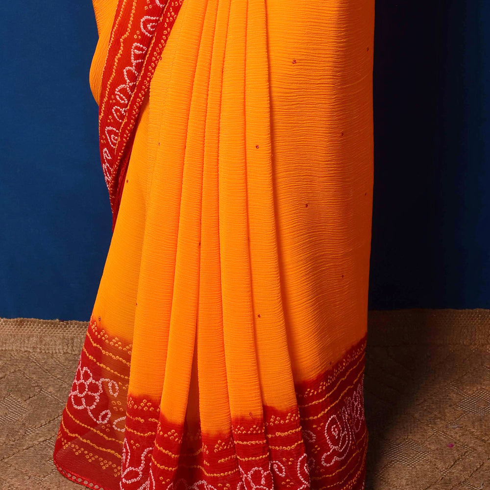 
                      
                        Classic Red and Orange Bandhani Chiffon Saree
                      
                    