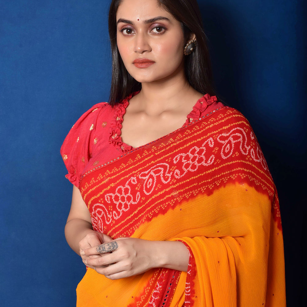 
                      
                        Classic Red and Orange Bandhani Chiffon Saree
                      
                    