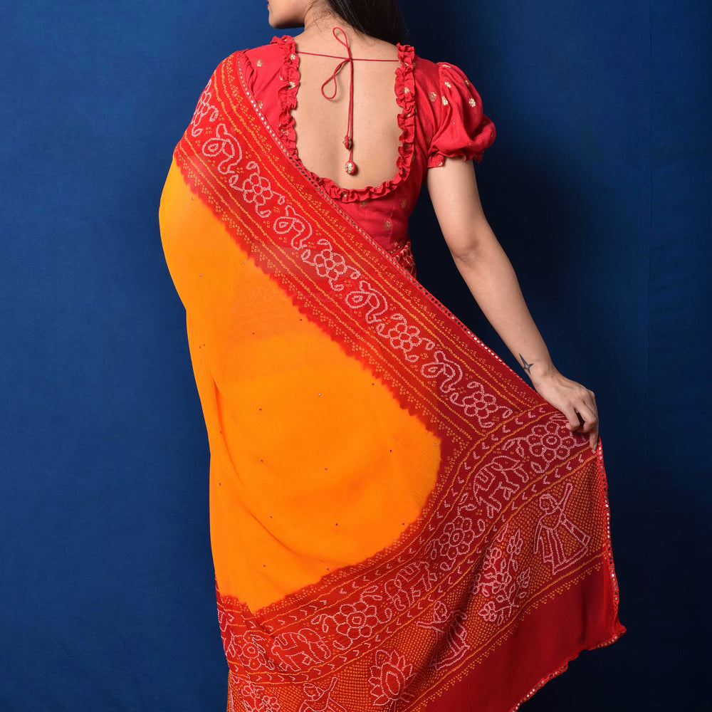 
                      
                        Classic Red and Orange Bandhani Chiffon Saree
                      
                    