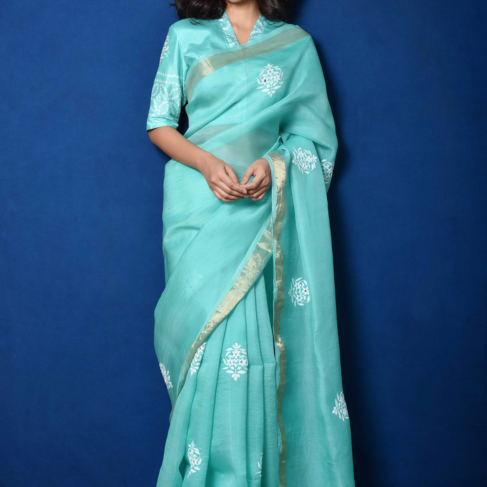 
                      
                        Bluish Green Organza Thread Embroidered Saree
                      
                    