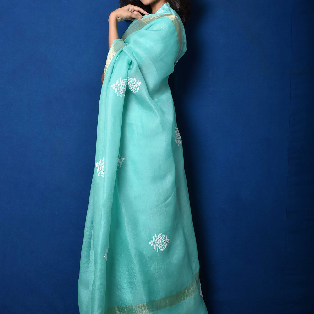 
                      
                        Bluish Green Organza Thread Embroidered Saree
                      
                    