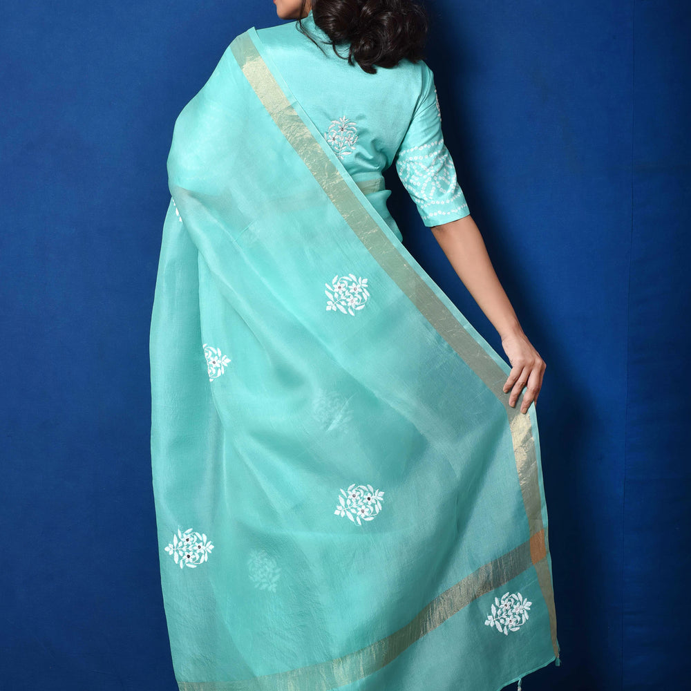 
                      
                        Bluish Green Organza Thread Embroidered Saree
                      
                    