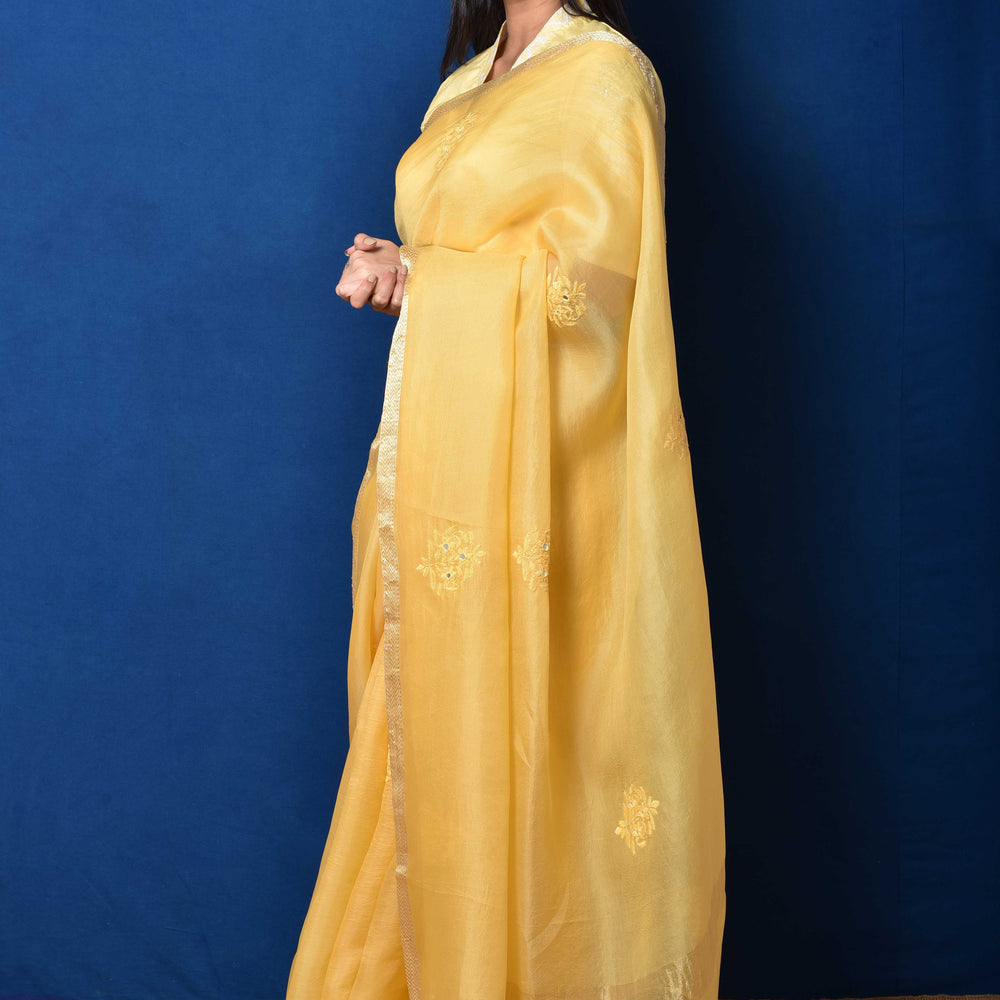 
                      
                        Yellow Organza Thread Embroidered Saree
                      
                    