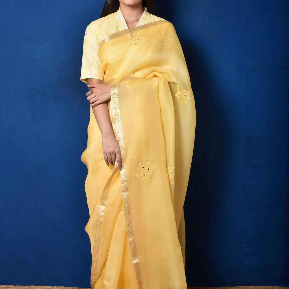 
                      
                        Yellow Organza Thread Embroidered Saree
                      
                    