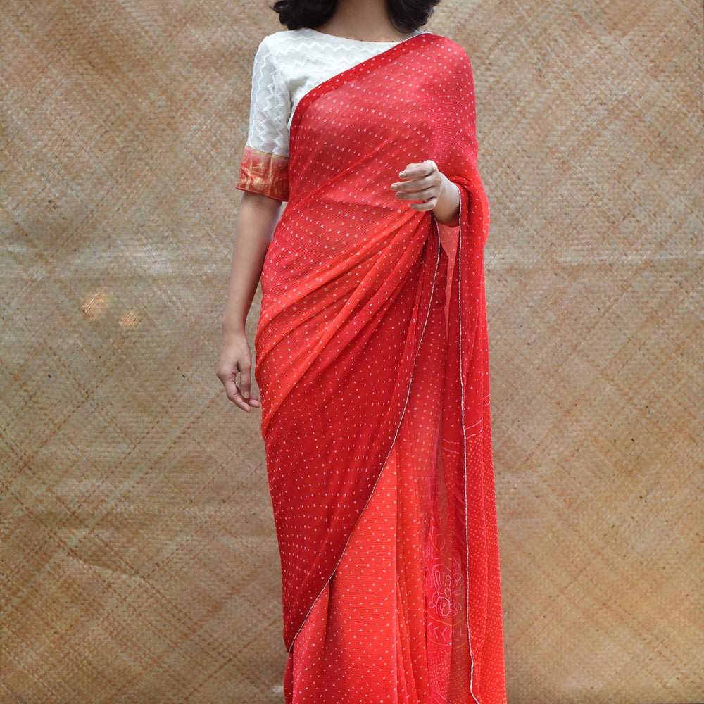 
                      
                        Red Peach Bandhani Saree in Pure Chiffon
                      
                    