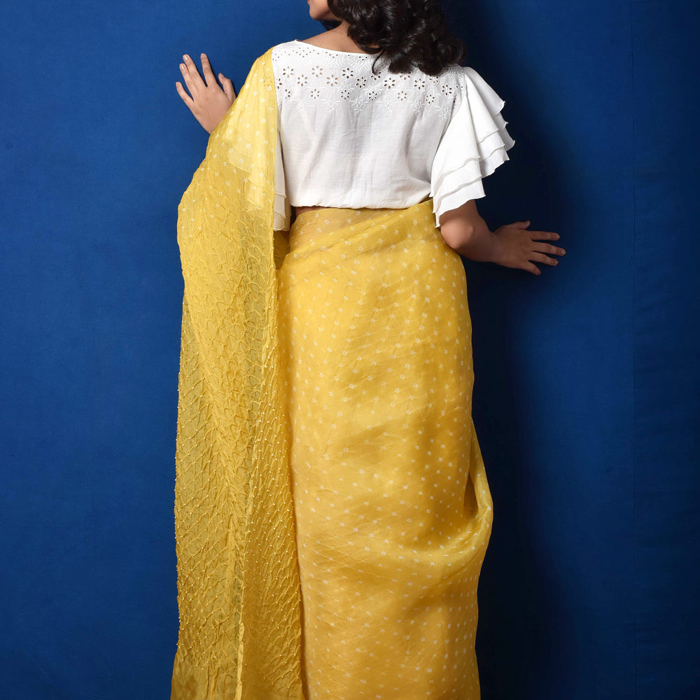 
                      
                        Bandhani on Pure Organza Saree in Pale Yellow
                      
                    