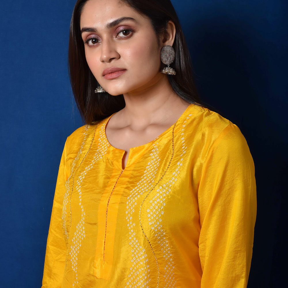 
                      
                        Waves Design Bandhani Pure Silk Kurta in Yellow
                      
                    