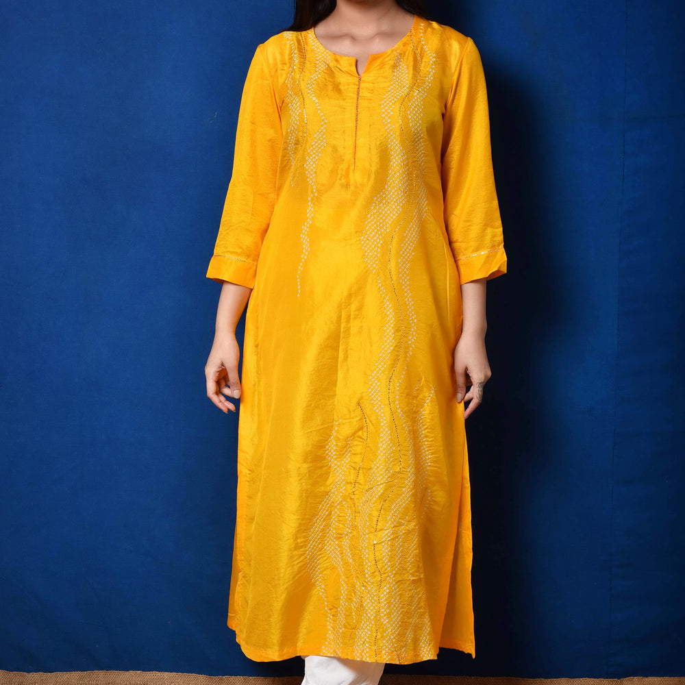 
                      
                        Waves Design Bandhani Pure Silk Kurta in Yellow
                      
                    