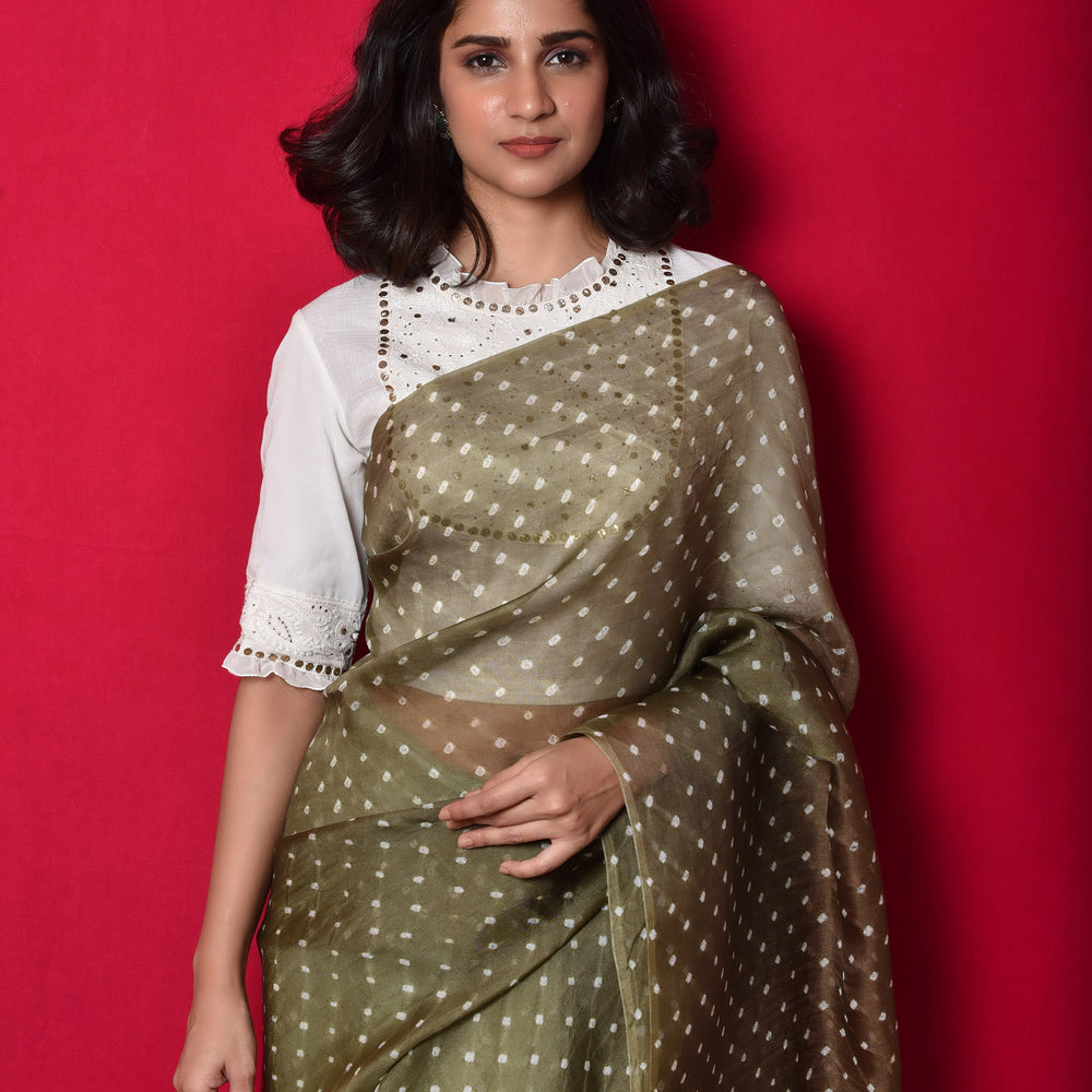 
                      
                        Bandhani on Organza Saree with Pattern on Pallu - Dull Green
                      
                    