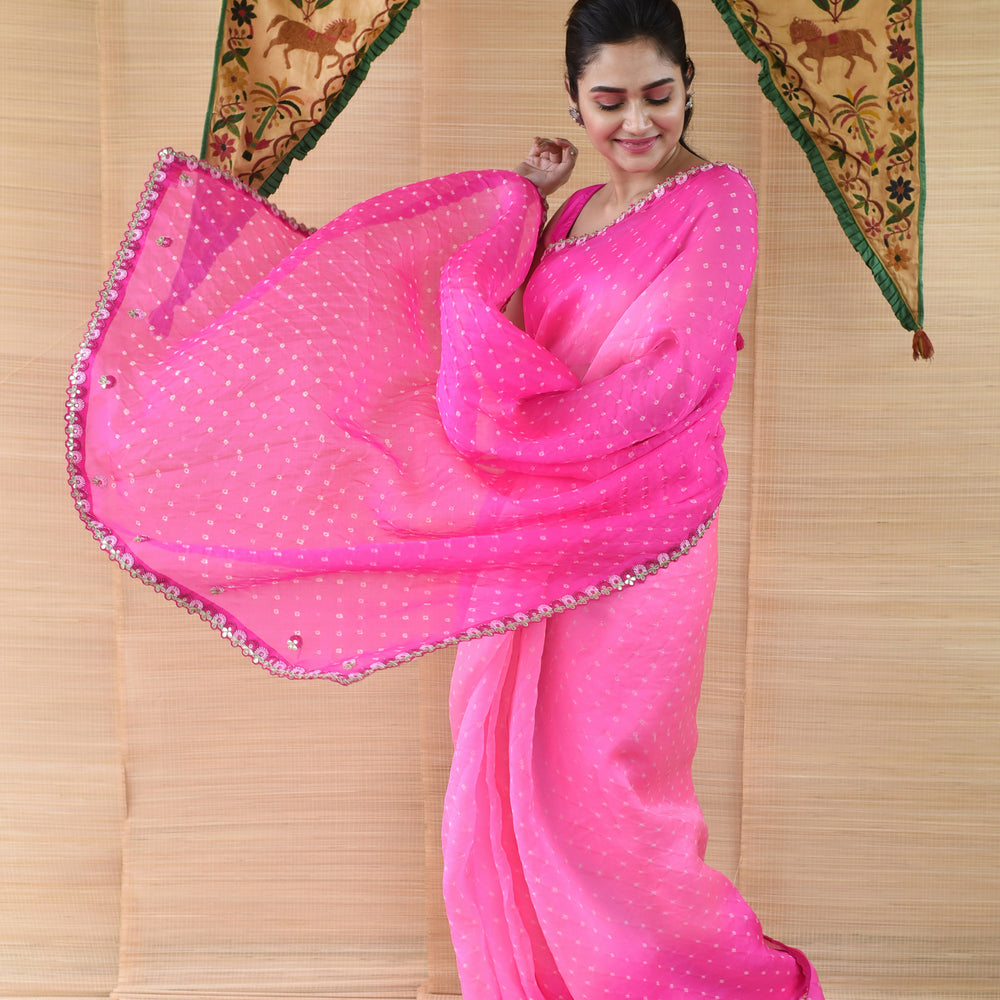 
                      
                        Pink Shaded Bandhani on Organza Saree with Gota Patti
                      
                    