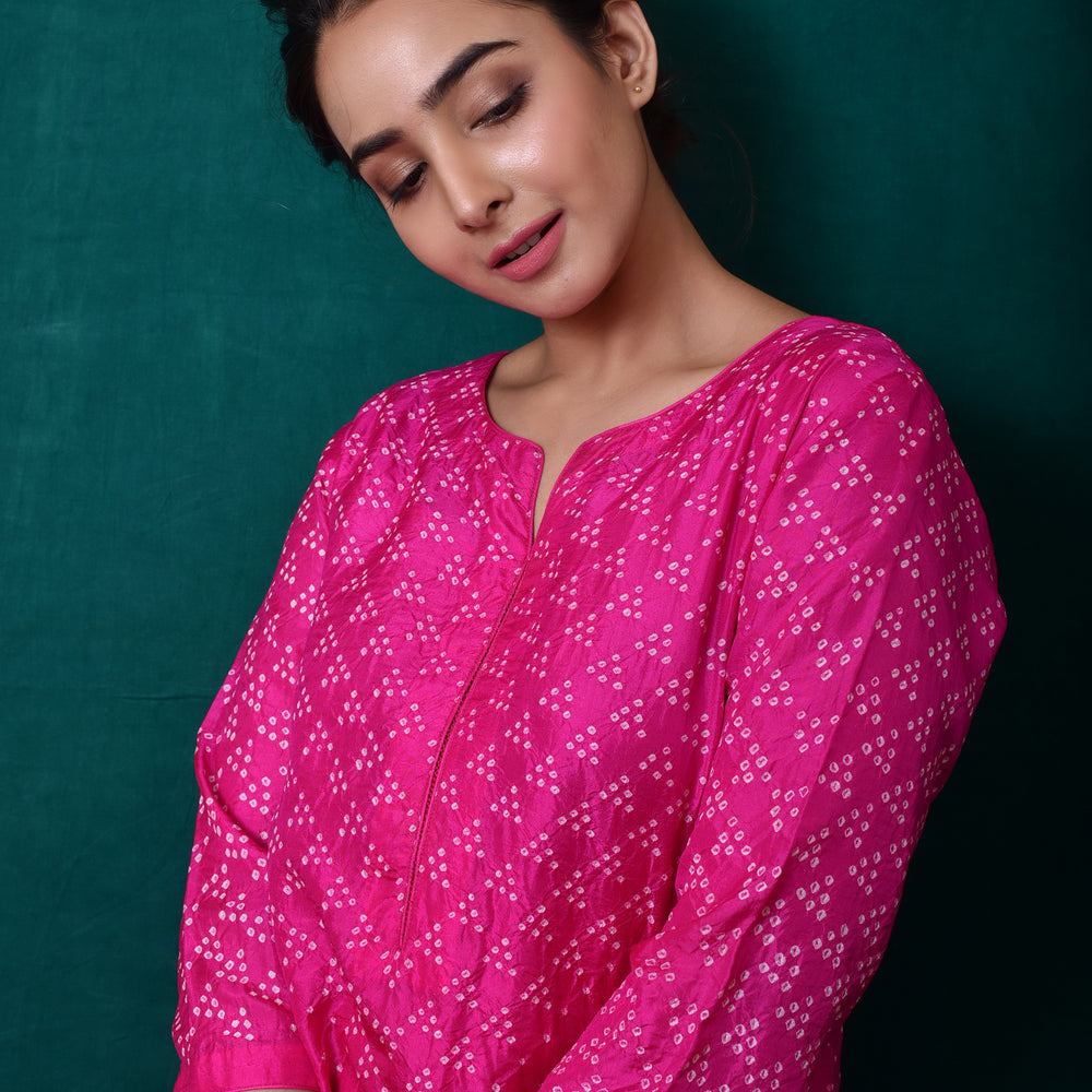 
                      
                        Bandhani on Pure Silk Kurta in Hot Pink
                      
                    