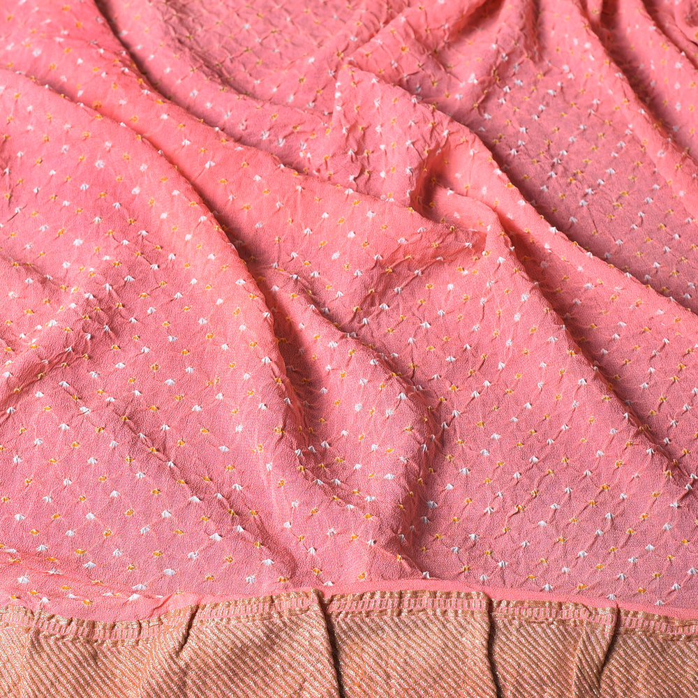 
                      
                        Floral Meenakari Motifs on a Peach Banarasi Bandhani Saree
                      
                    