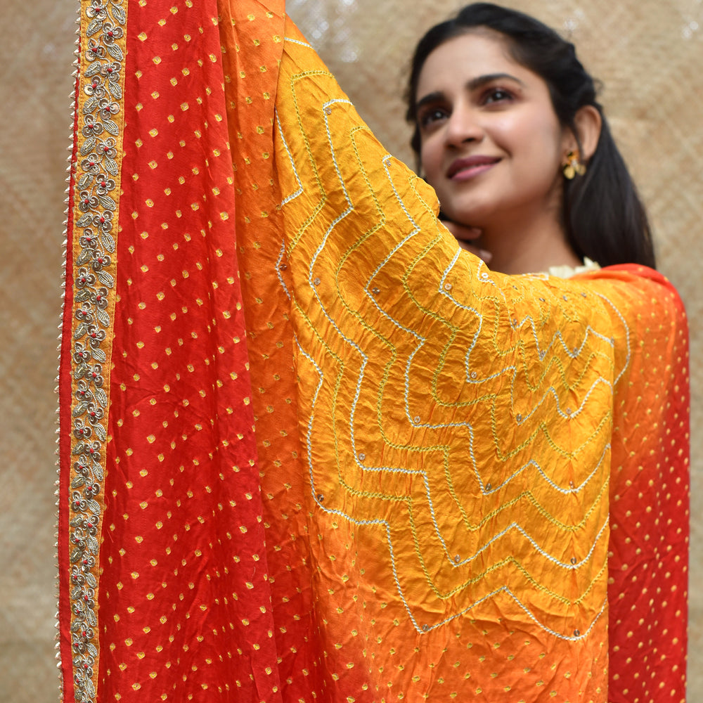 
                      
                        Bandhani on Gaji Silk Peeliya Dupatta with Zardozi
                      
                    