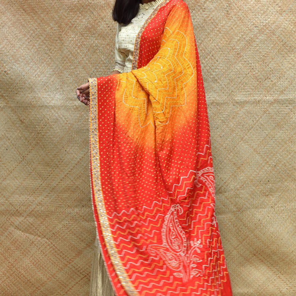 
                      
                        Bandhani on Gaji Silk Peeliya Dupatta with Zardozi
                      
                    