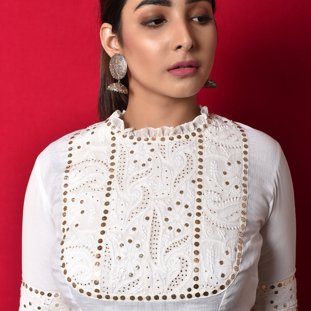 
                      
                        Classic Chikankari Mukaish Blouse in Georgette + Kota
                      
                    