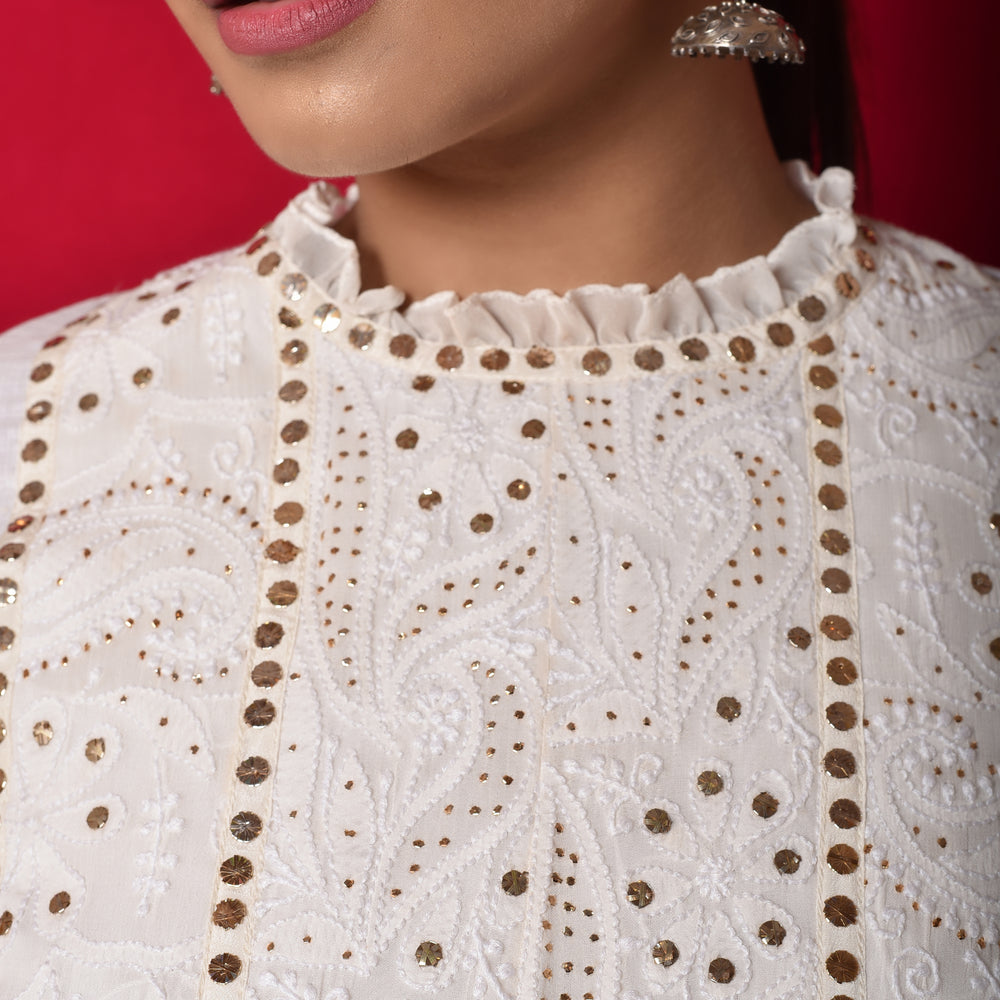 
                      
                        Classic Chikankari Mukaish Blouse in Georgette + Kota
                      
                    