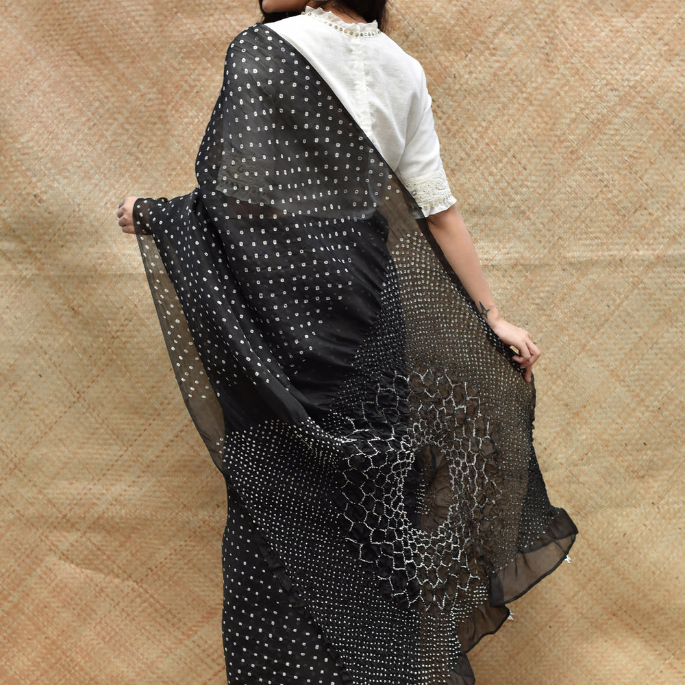 
                      
                        Bandhani on Organza with Pattern on Pallu - Black
                      
                    