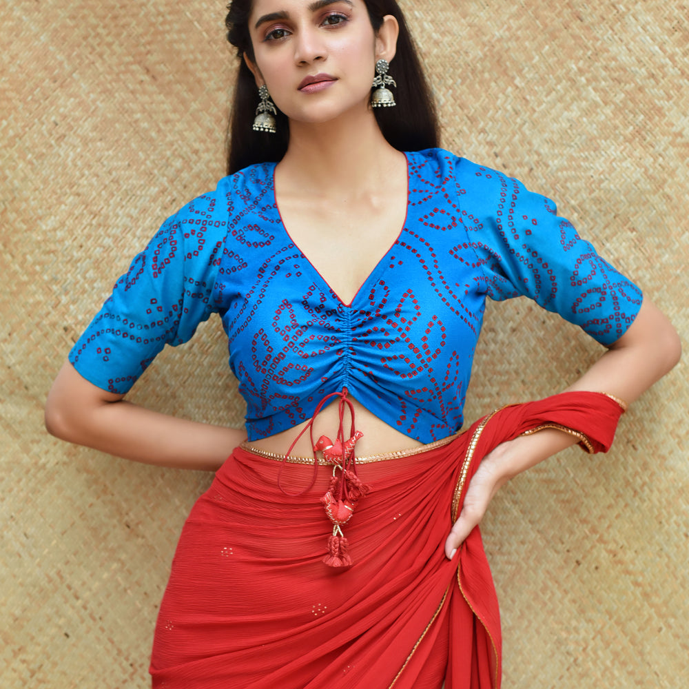 
                      
                        Blue Bandhani on Crepe Dori Blouse
                      
                    