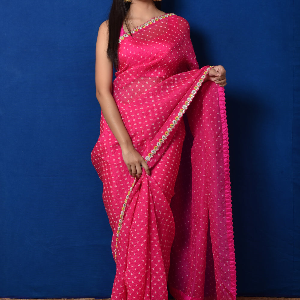 
                      
                        Bandhani on Organza Saree with Gota Patti Border
                      
                    