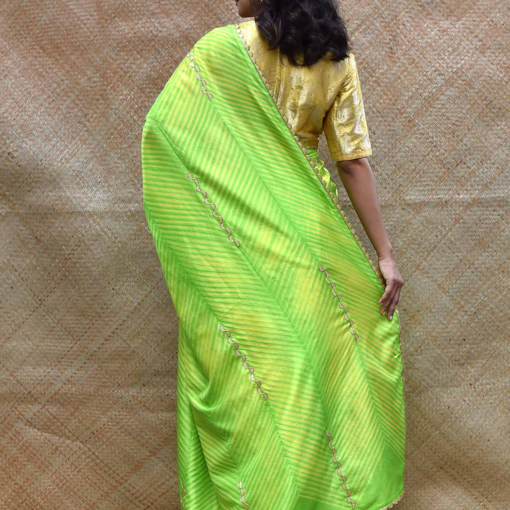 
                      
                        Arashi on Pure Silk Saree with Gota Patti - Yellow Green
                      
                    