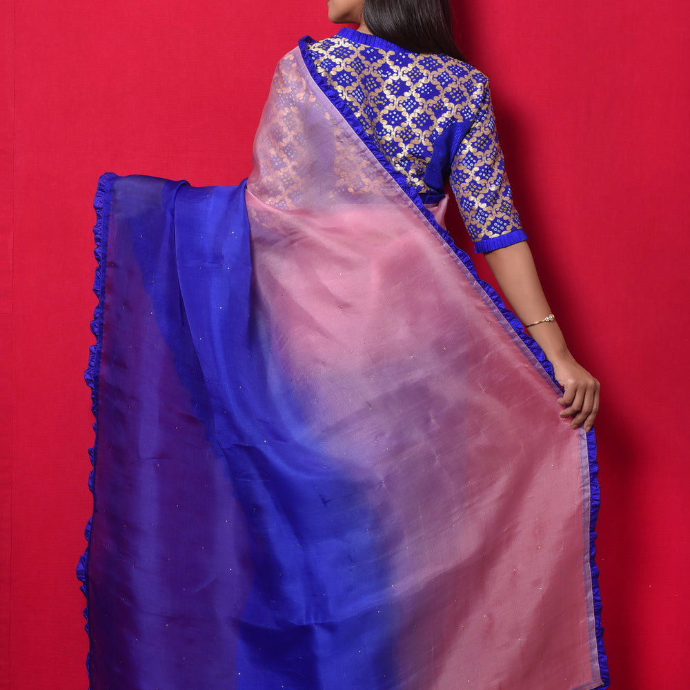 
                      
                        Shaded Organza Saree with Bandhani Blouse - Blue Pink
                      
                    