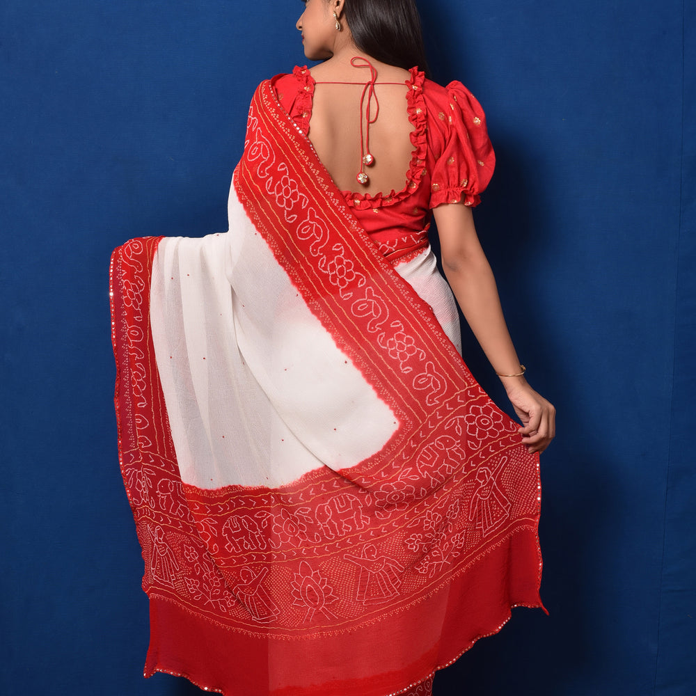 
                      
                        Classic Red and White Bandhani Chiffon Saree
                      
                    