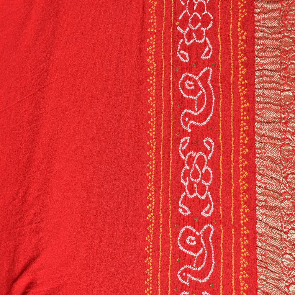 
                      
                        Pure Zari Banarasi Bandhani Saree in a Festive Red
                      
                    