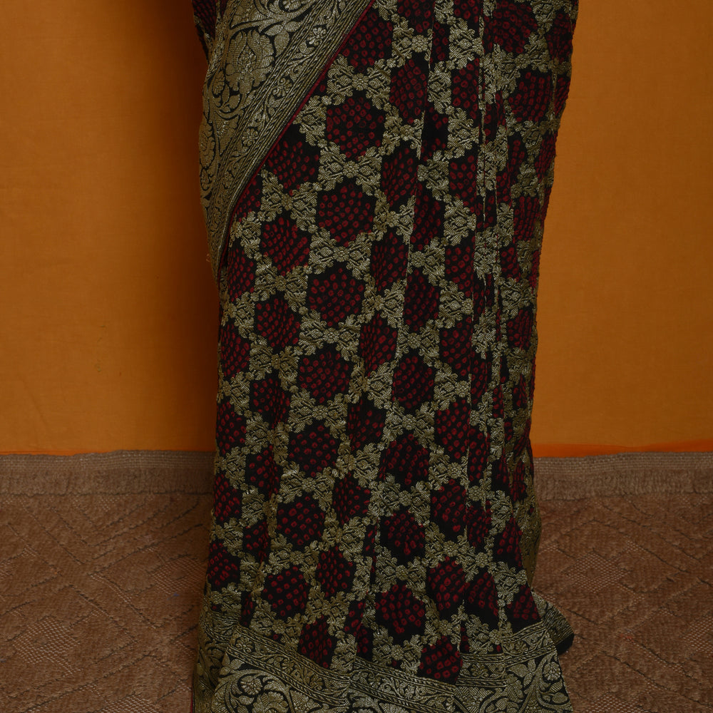 
                      
                        Classic Gharchola Saree in Black
                      
                    