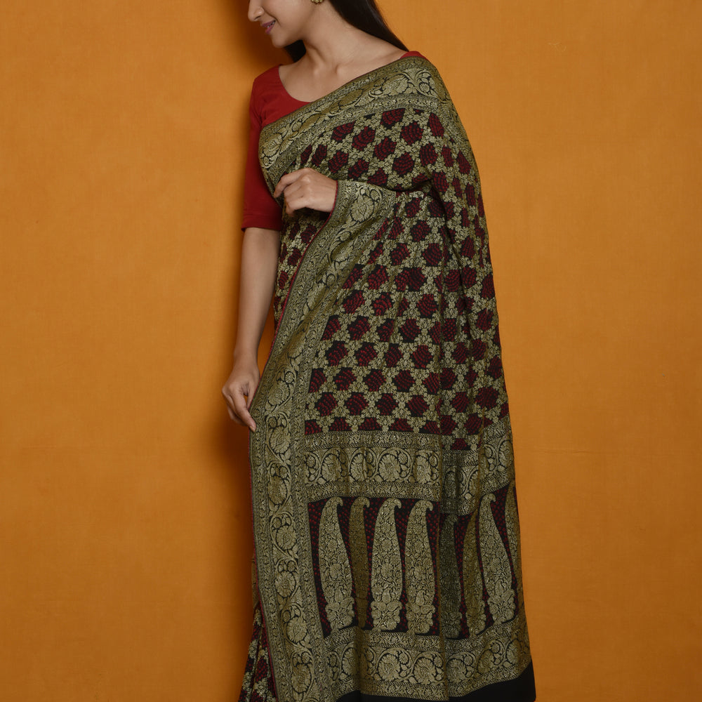 
                      
                        Classic Gharchola Saree in Black
                      
                    